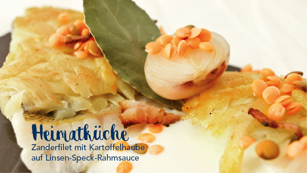 Heimatküche –Zanderfilet mit Kartoffelhaube auf Linsen-Speck-Rahmsauce